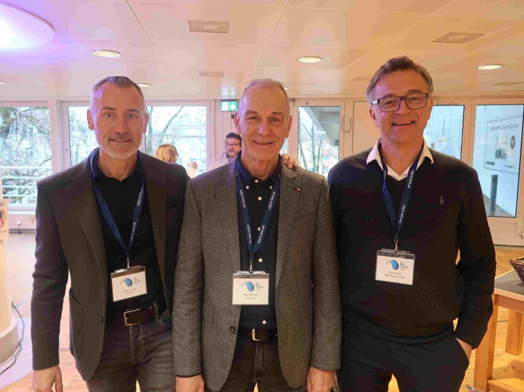 Drei Männer auf der AS Infotagung in Basel.